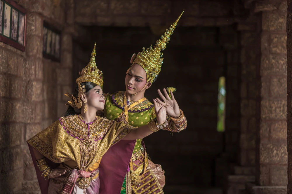 Entertainment บันเทิง - Thailand dancing couple in masked khon performances with ancient temple
